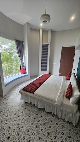 Family Triple Room, Valley View | Laptop workspace. Lemongrass Hill by Thottumkal Resorts