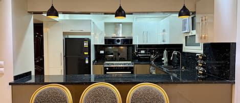 Fridge, oven, stovetop, electric kettle