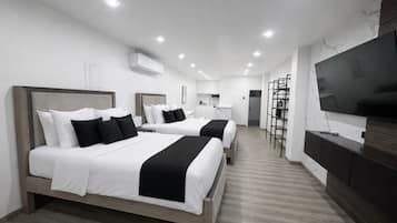 Chambre Double Luxe | Draps en coton égyptien, literie de qualité supérieure, surmatelas