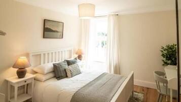 4 dormitorios, tabla de planchar con plancha, wifi gratis y ropa de cama