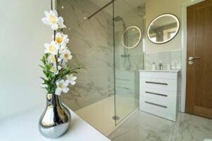 Separate tub and shower, deep soaking tub, hair dryer, towels