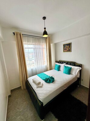 3 habitaciones, tabla de planchar con plancha, wifi y ropa de cama