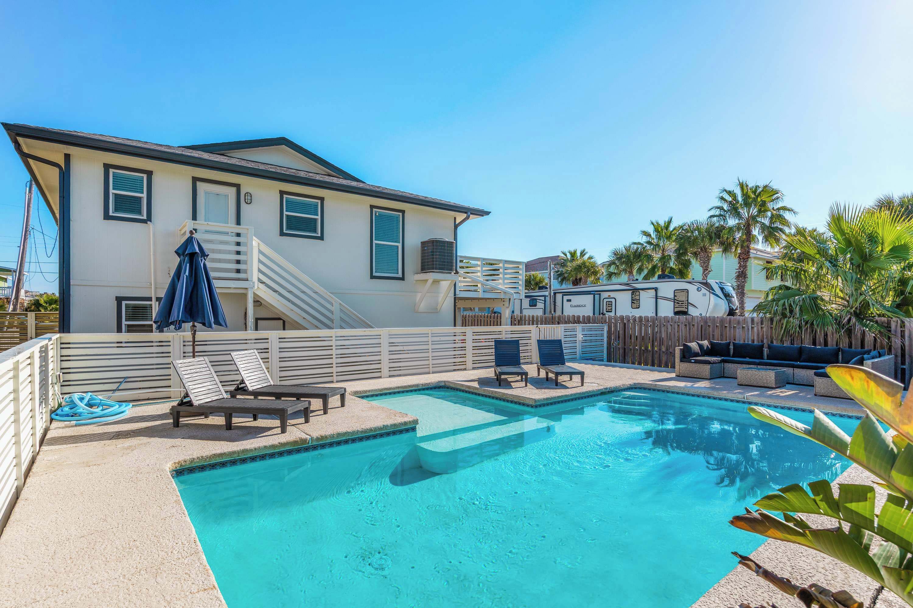 Outdoor pool, pool umbrellas, pool loungers
