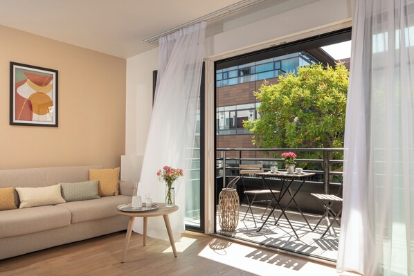 Appartement Deluxe, 2 chambres | Coin séjour