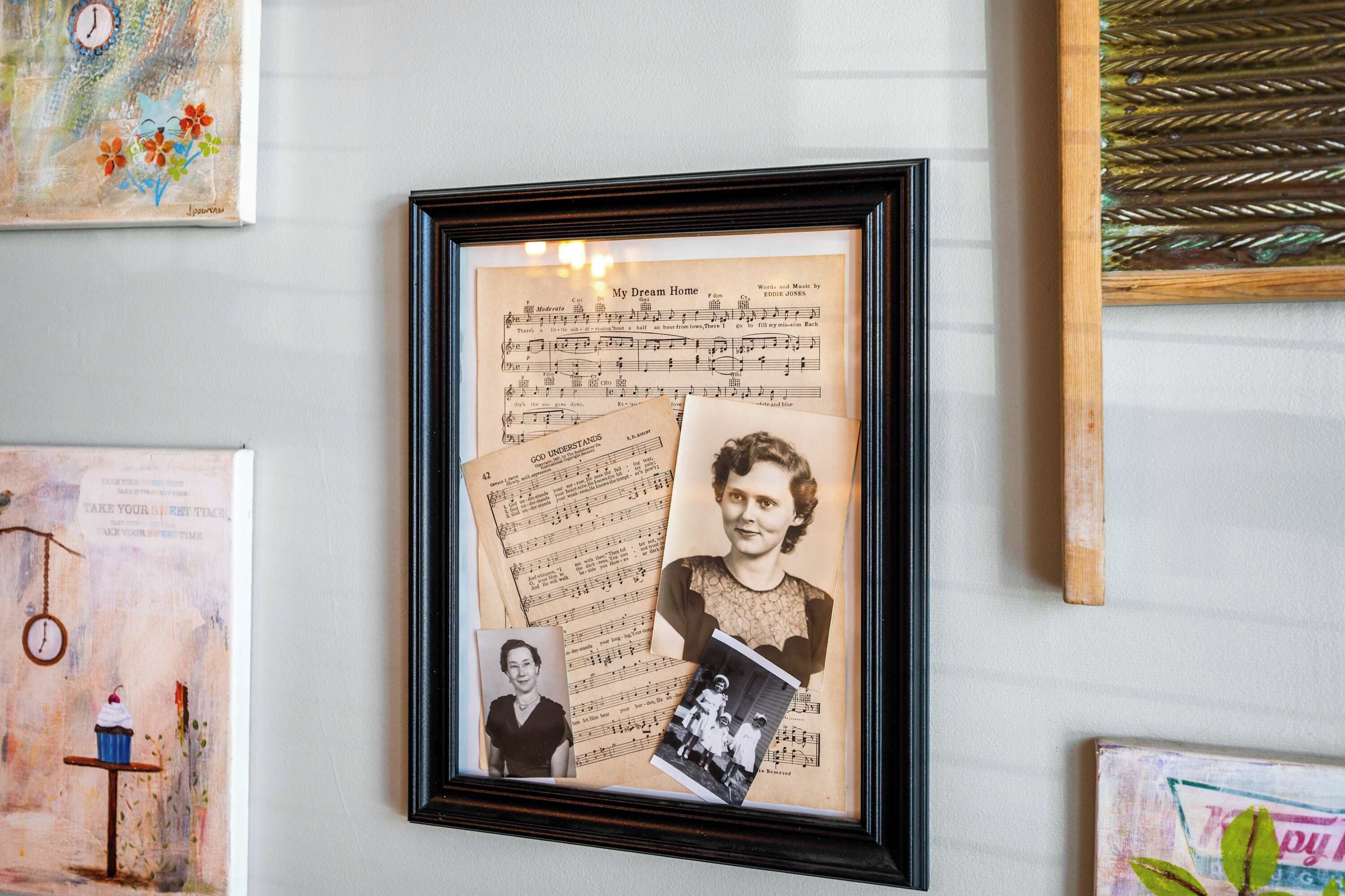 A framed photograph with musical notes and a vintage photograph.