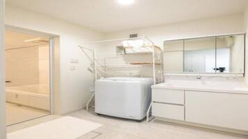 Hair dryer, bidet, towels, soap