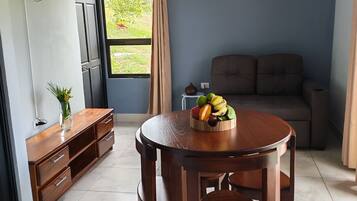 Basic Triple Room, Mountain View | Living area