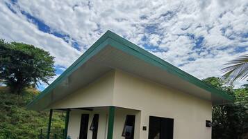 Basic Quadruple Room, Mountain View | Living area