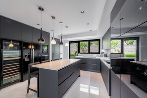 Private kitchen - Luxury Villa Black Cube with heating pool (Brašina)
