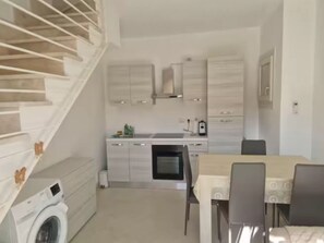 Appartamento, 1 camera da letto, patio | Cucina privata