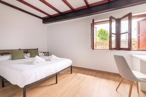 A bedroom with a bed, a desk, and a window with an open shutter. - InfinityCoast 3 byFidalsa (Piélagos)