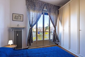 2 bedrooms, iron/ironing board - GuestHost - A comfortable and welcoming 83 square meters apartment, perfect for six people, located on the second floor of a 1960s building with an elevator (NOT accessible to disabled guests).The property enjoys an ideal location within the city of Parm (Parma)