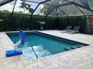 Outdoor pool, a heated pool - Family-friendly, heated salt water pool, near beaches, and downtown Fort Myers. (Fort Myers)