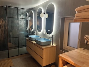 A modern bathroom with two sinks, a glass shower enclosure, and a wooden vanity. - Pamela Loft, Aix-les-Bains (Aix-les-Bains)