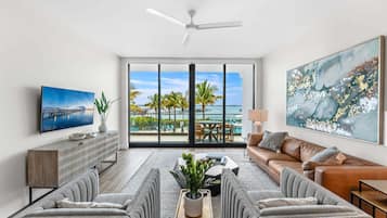 Three-Bedroom Premium Apartment with Resort View, Unit #205-205 | Living area | 60-inch Smart TV with cable channels