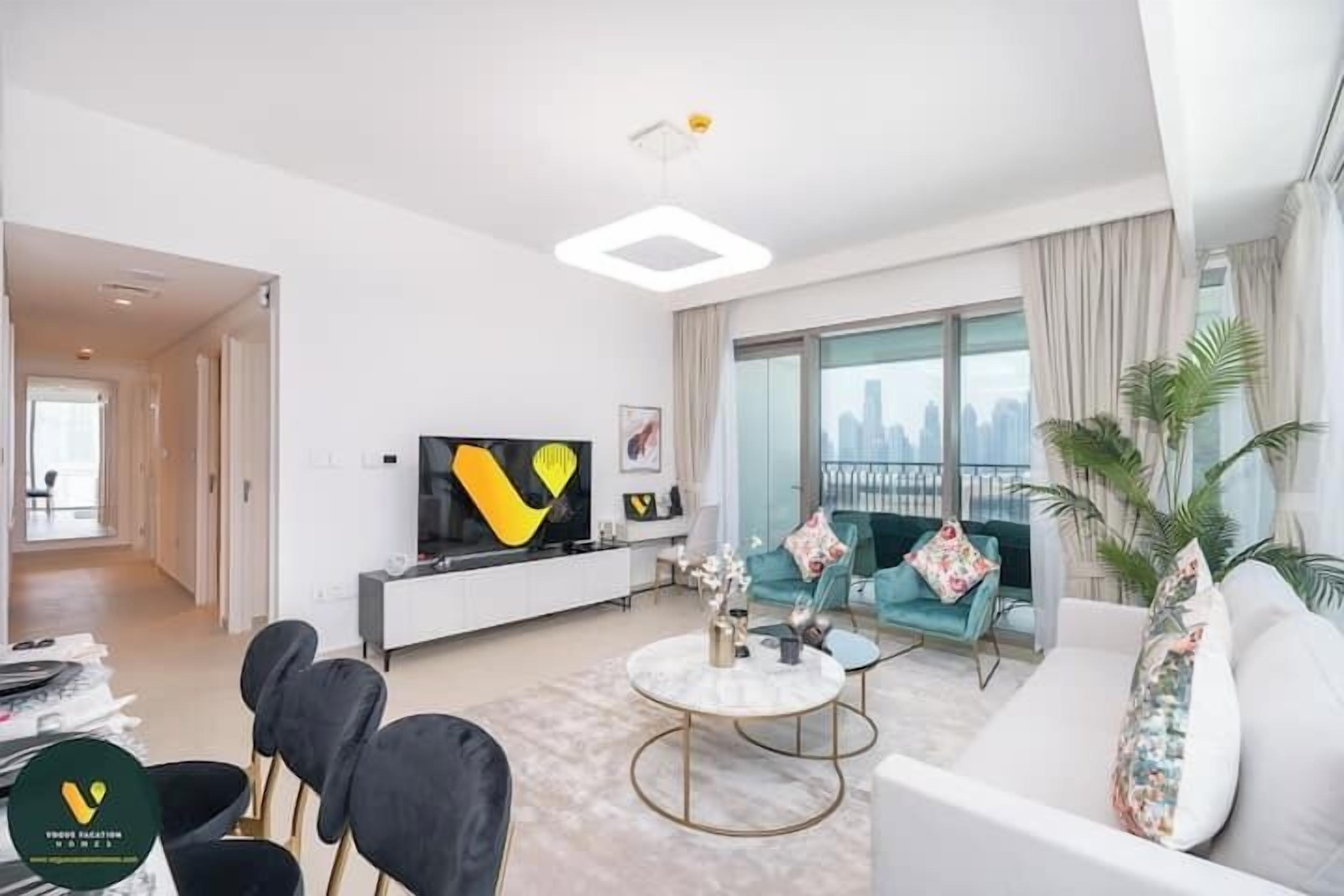 Luksusleilighet, balkong, byutsikt | Spiseområde på rommet