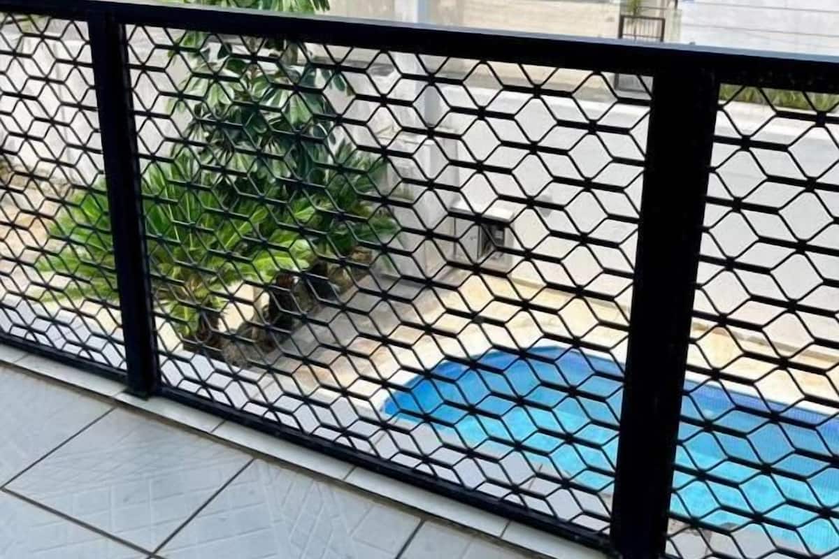 Family Room, Balcony, Pool View | Free WiFi