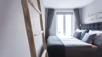 1 slaapkamer, een strijkplank/strijkijzer, wifi, beddengoed