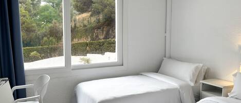 Basic Triple Room | In-room safe, blackout drapes, free WiFi