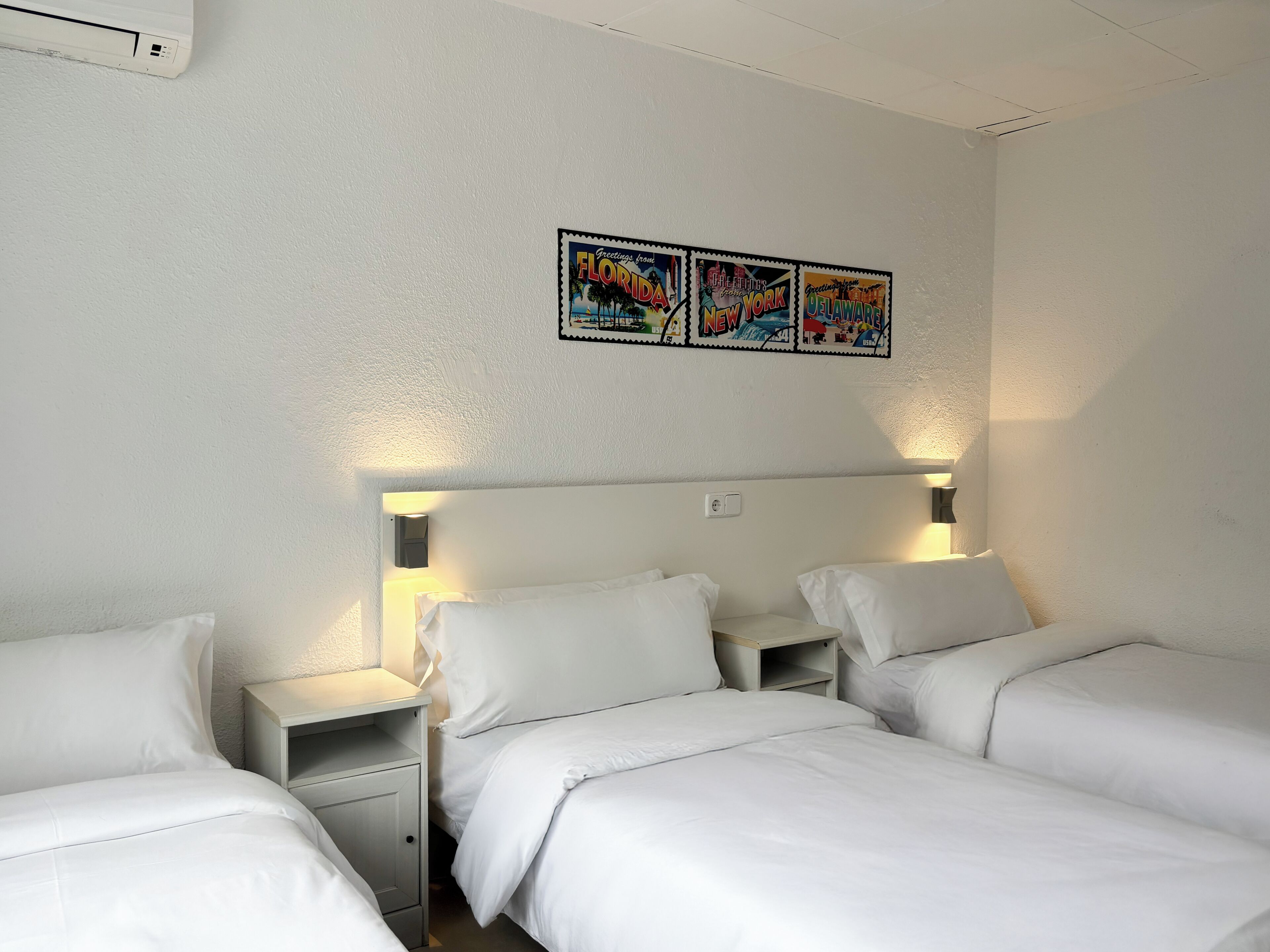 Basic-værelse til 3 personer | Pengeskab på værelset, mørklægningsgardiner, gratis Wi-Fi