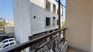 Comfort Room, Balcony, City View | Property grounds