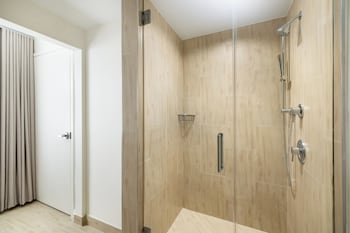 Shower, hair dryer, towels, soap at Collins Court South Beach