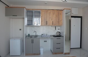 Luxury Suite, Balcony | Private kitchen