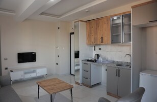 Luxury Suite, Balcony | Living area