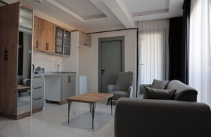 Deluxe Suite, Balcony, Sea View | Living area