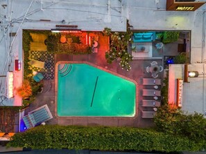 An aerial view of a hotel with a swimming pool, outdoor seating, and a bar area. - Exclusive use of the property (All 5 units) (Palm Springs)