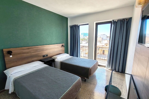 Twin Room, Balcony, City View | In-room safe, desk, free WiFi