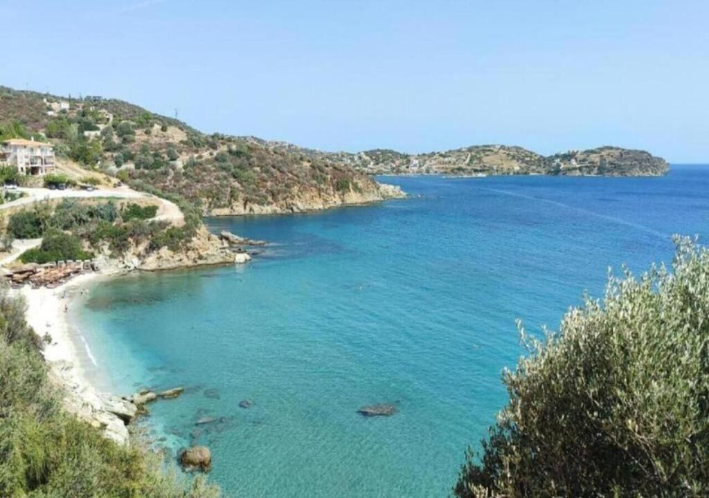 On the beach, sun-loungers