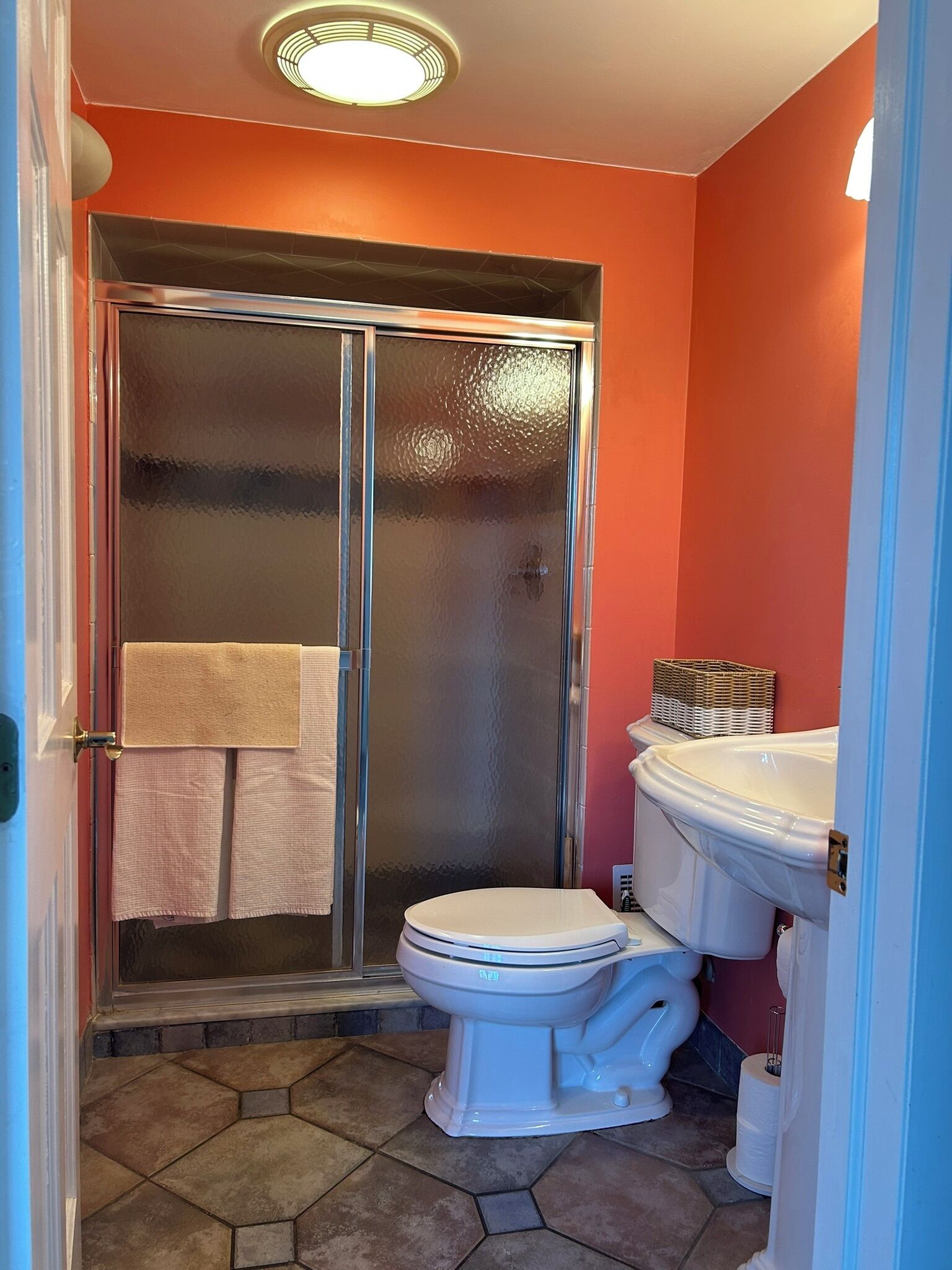 Shower, towels, soap, toilet paper