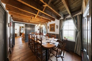 Dining Area | Rustic Table | Exposed Wood Ceiling