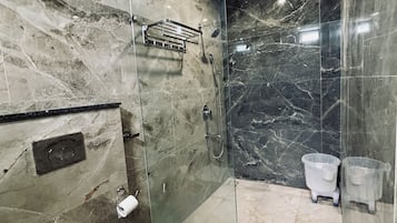 Shower, slippers, towels, soap