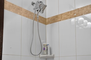 Shower, hair dryer, towels, soap