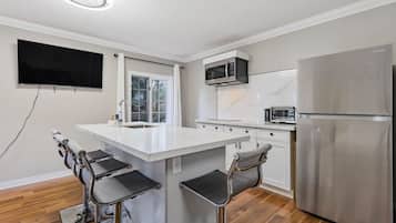 Fridge, microwave, coffee/tea maker, toaster