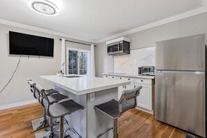 Fridge, microwave, coffee/tea maker, toaster