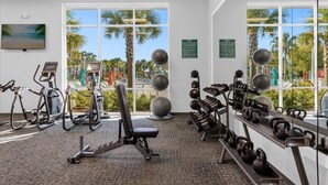 A gym with cardio machines, free weights, and exercise balls. - 5 BD/ 4.5 BA Windsor Island (987 PD) (Davenport)