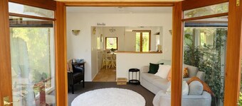 Private countryside retreat with outdoor spa, river access and orchard