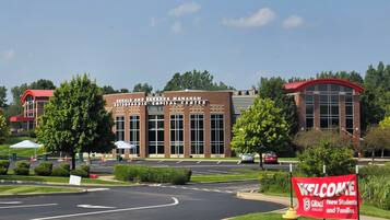 A building with a sign reading 'Ronald and Barbara Manahan Orthopedic Capital Center.'