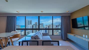 Apartamento básico | Área de estar | Smart TV 40 polegadas com canais digitais