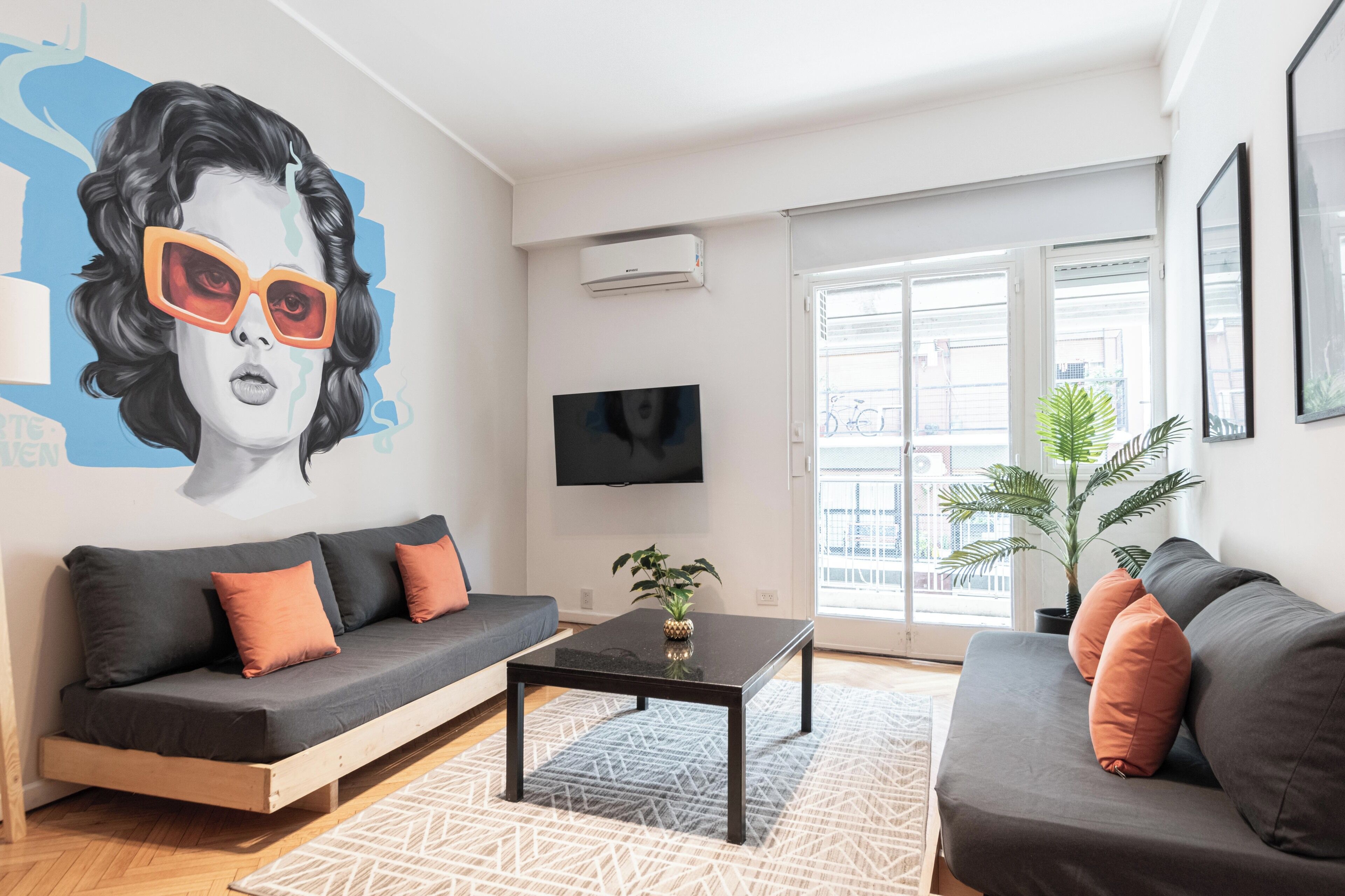 Apartamento conforto, vista para a cidade | Área de estar