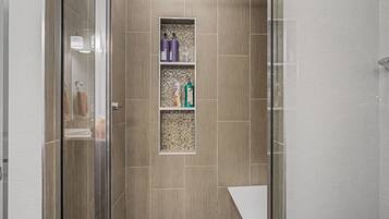 Shower, towels, soap, toilet paper