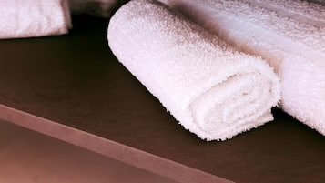 Hair dryer, slippers, towels, soap