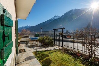 Casa Olinda, which opens to Mount Emilius and the Gran Paradiso massif.