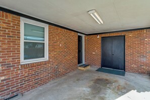 A brick building with a single door and a window. - Near Medical Centers & Fort Jackson! Quiet Home (Columbia)