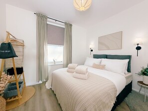 1 habitación, tabla de planchar con plancha, wifi gratis y ropa de cama 