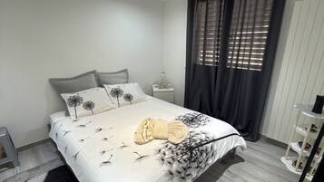 1 chambre, fer et planche Ă repasser, Wi-Fi, draps fournis