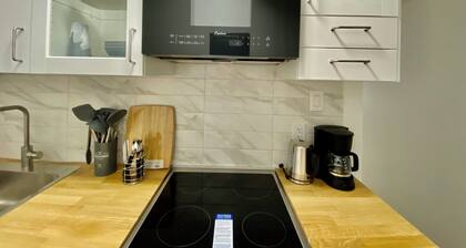 Sunlit large room in a modern apartment plus a private living area to lounge